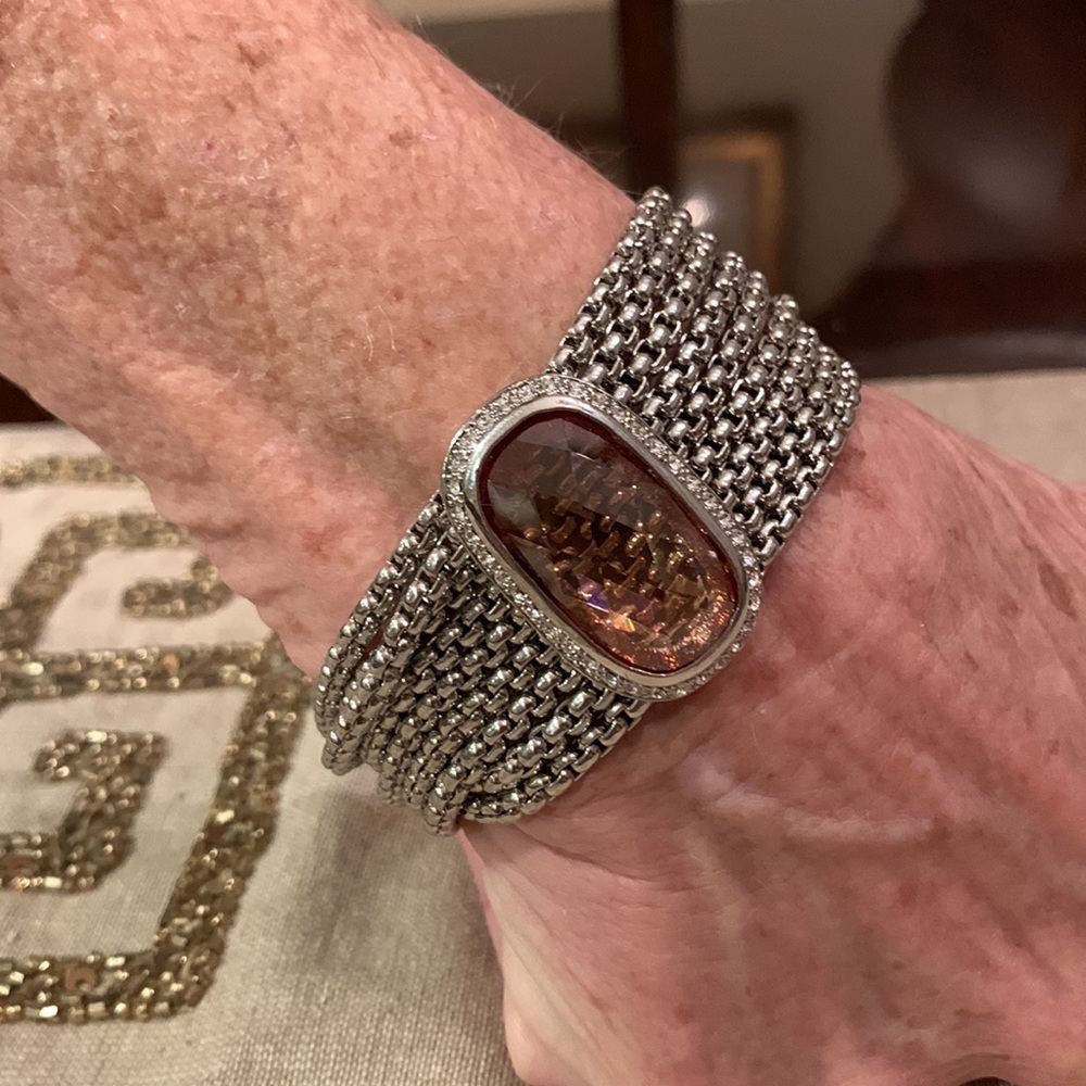 Silver bracelet with topaz stone